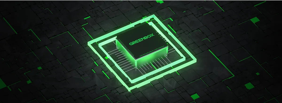 A glowing green chip marked GREENBOX on a dark circuit surface