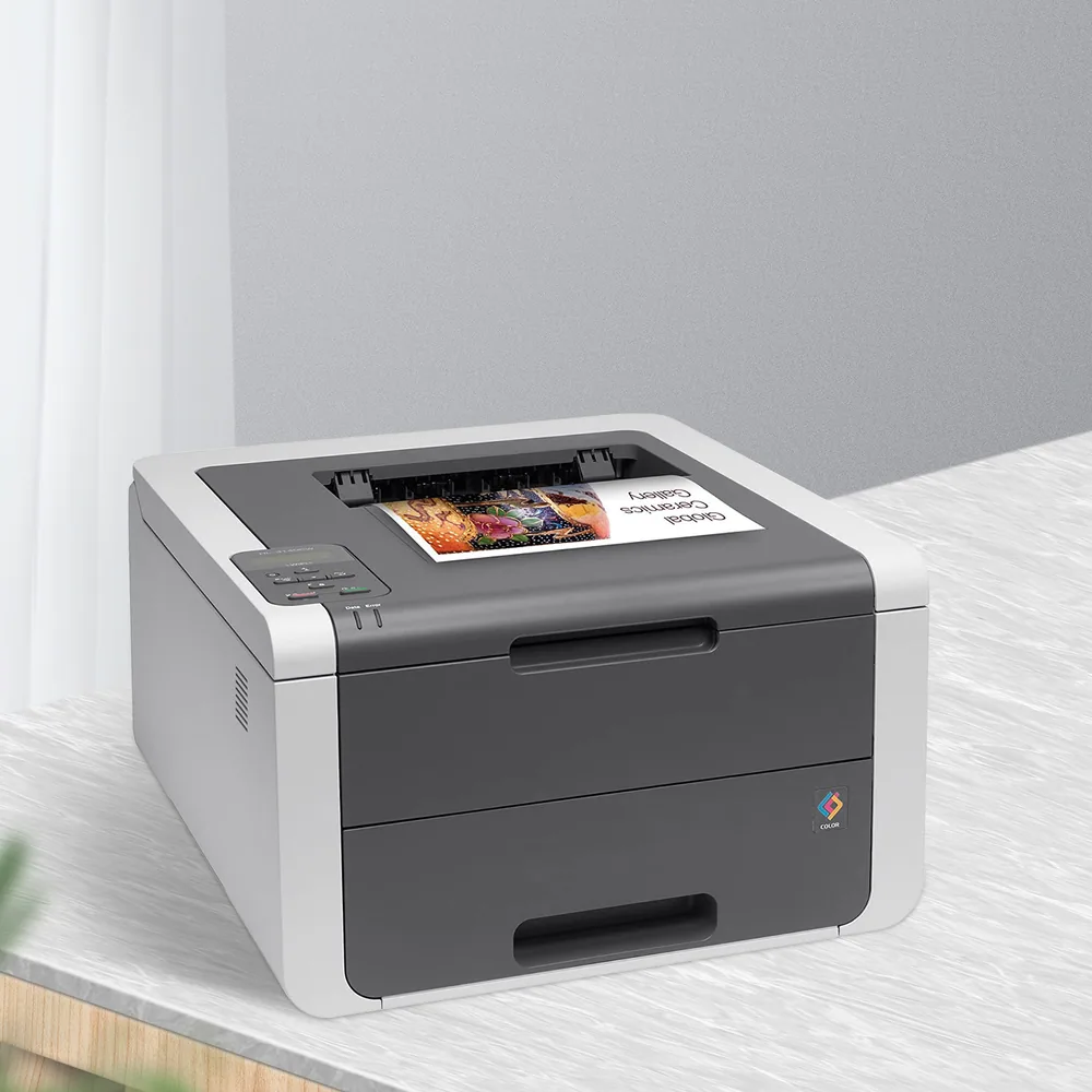 A color laser printer on a white desk with a printed page in the tray